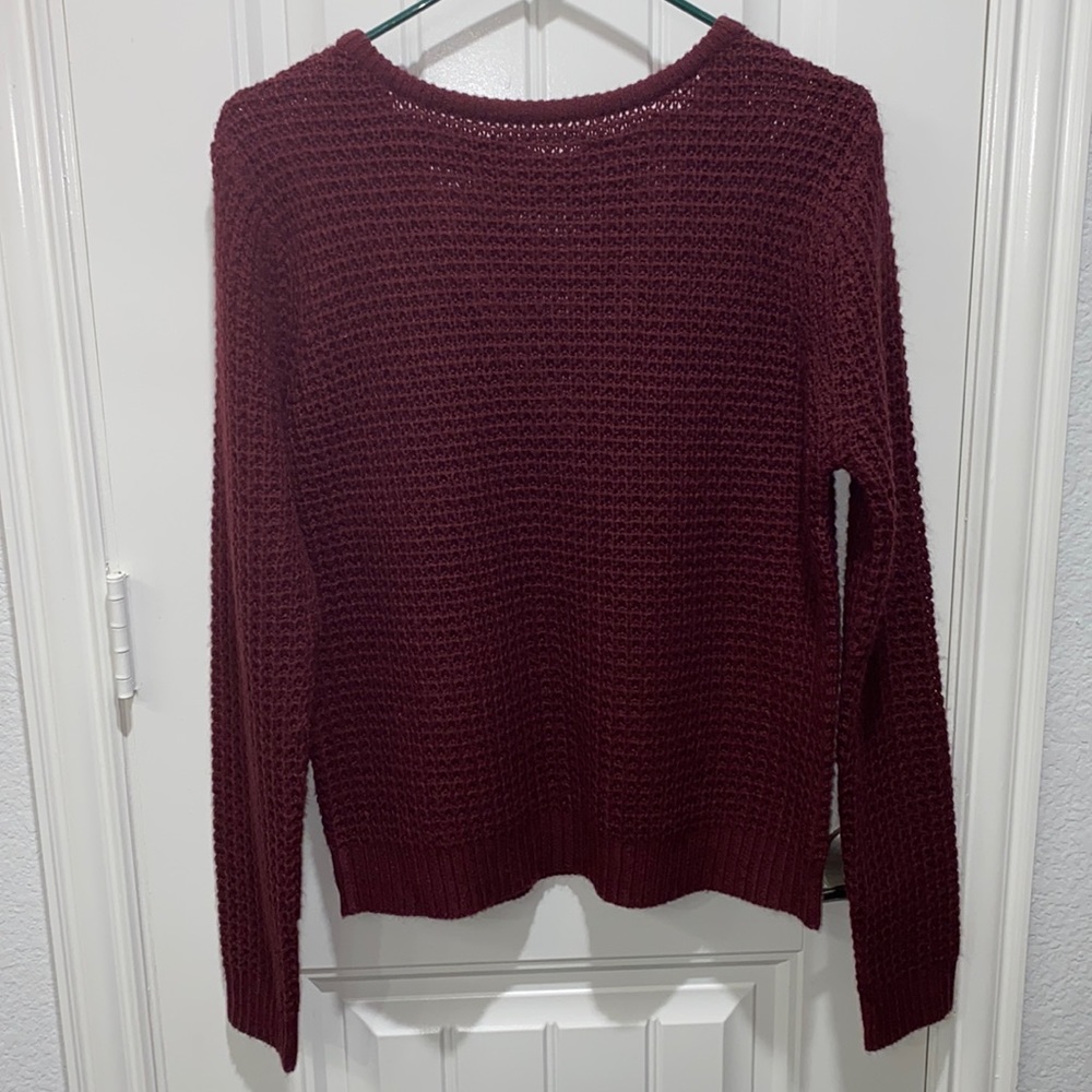 Ambiance Apparel maroon sweater with open back. Size large.